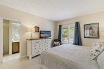 Fresh and comfy master bedroom with King bed